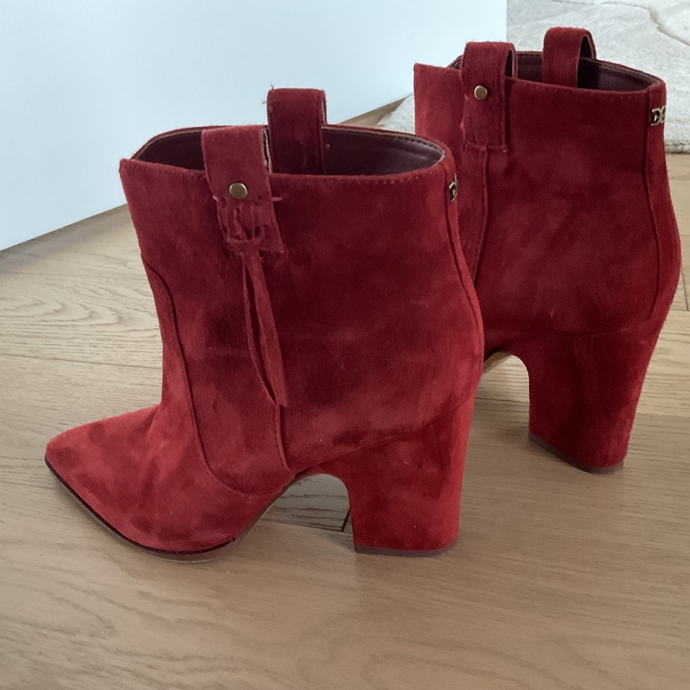 Red suede above ankle boots.